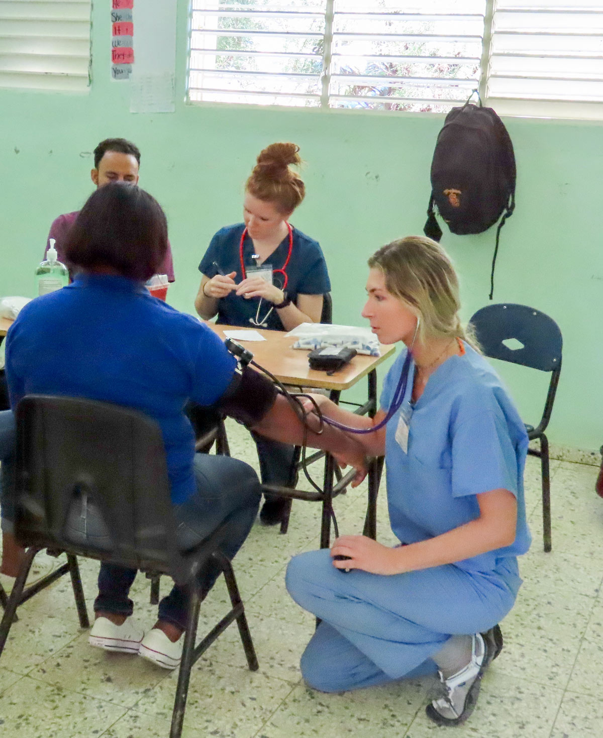 public health student providing health screening in the Dominican Republic