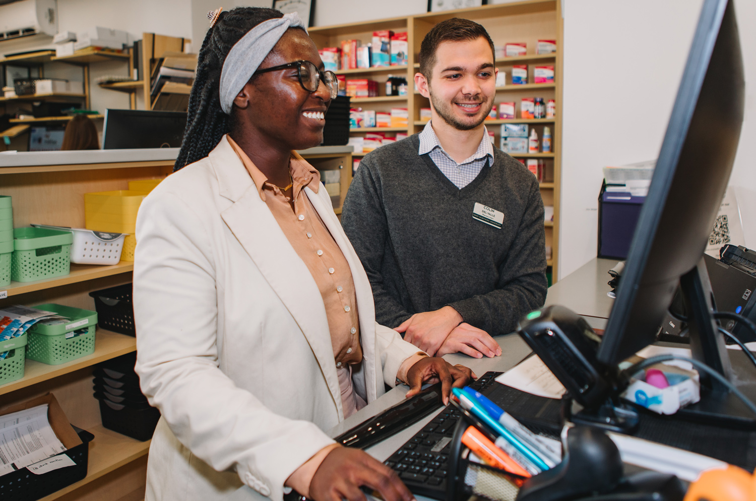 students working in the on campus pharmacy