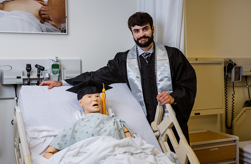 Photo of Brenton with his cap and gown