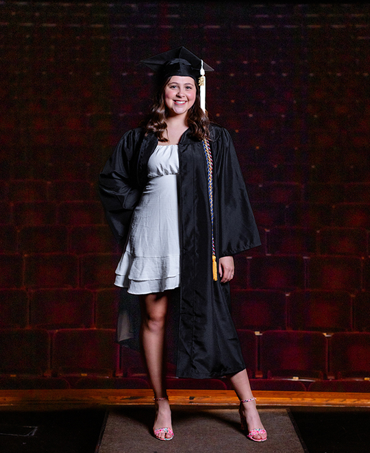 Photo of Kennedy in her graduation cap and gown