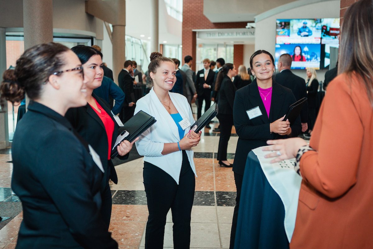 Students in business at career fair