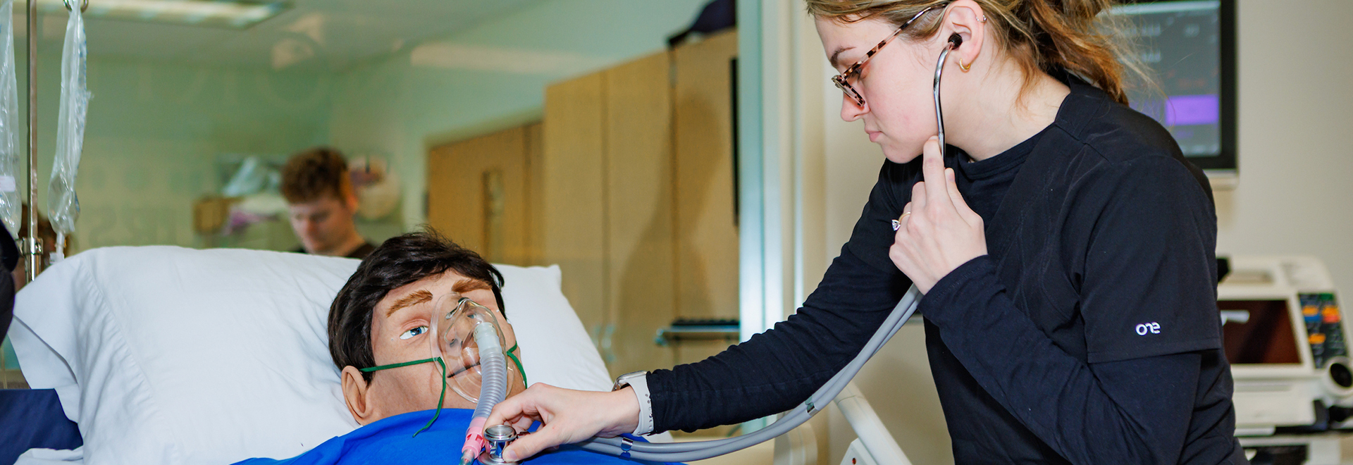 Photo of ONU nursing student practicing on a manneguin