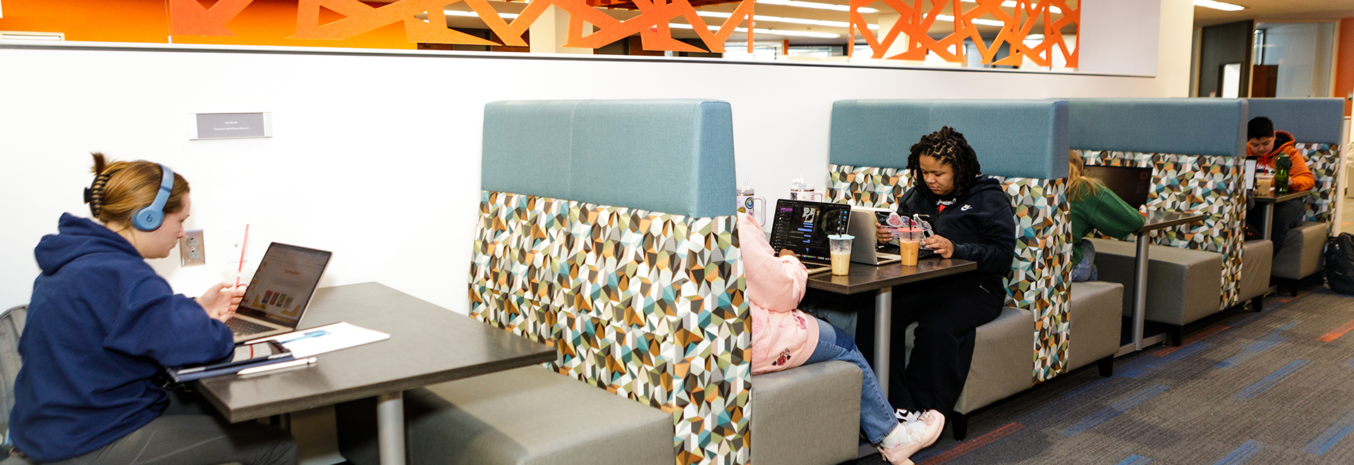 Photo of ONU's Student Success Center with students in booths studying