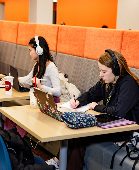 Photo of ONU students at tables studying individually