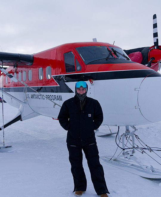 Another photo of Laurent with a smaller plane behind her