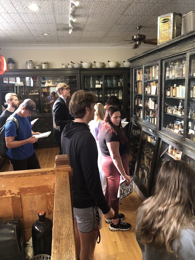 Public history students explore the Piersdorf Pharmacy Museum on the ONU campus, which is set up like a turn-of-the-20th-century pharmacy.