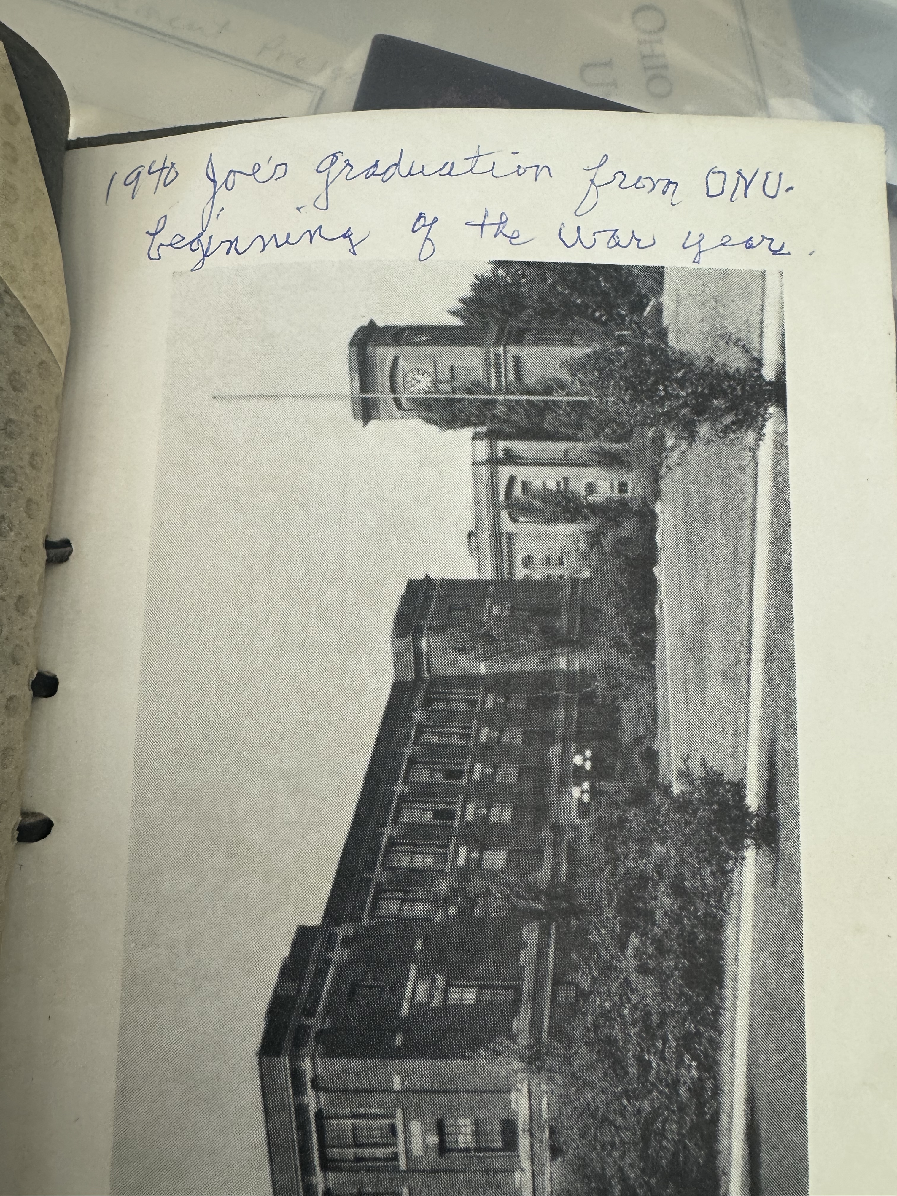 Handwritten message inside a 1940 commencement program makes note of the war.