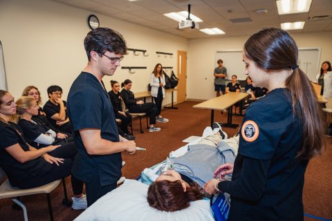 Photo from the Nursing Simulation, Students assess patient