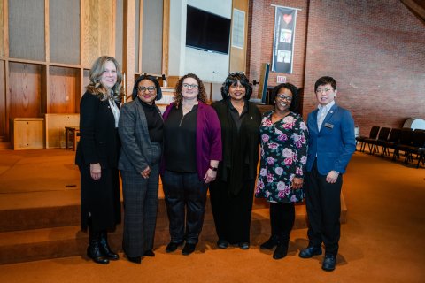 Group photo including Sharetta and President Baumann amongst others