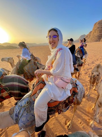 Photo of Juliana on a camel