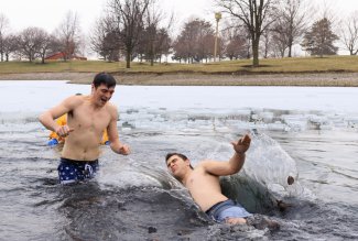 Ohio Northern University Delta Sigma Phi members taking the Polar Bear Plunge in 2020.