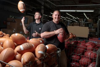 ONU alumni working at the Ada Wilson Football Factory