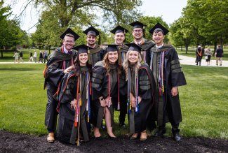 Pharmacy grads posing before '22 commencement at ONU.