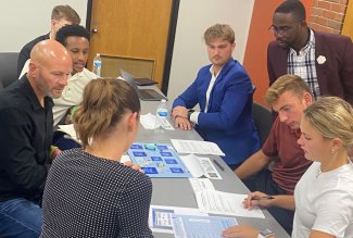 Participants working on an activity at a September '23 workshop offered by Pfizer at Ohio Northern University.