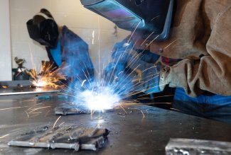 Ohio Northern University engineering students practicing welding skills.