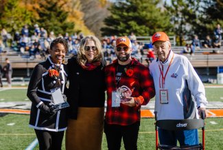 ONU's Young Alumni Award '23 recipients Chelsea Mack and Tarry Summers with Pres. Melissa J. Baumman, and alum Bill Robinson.