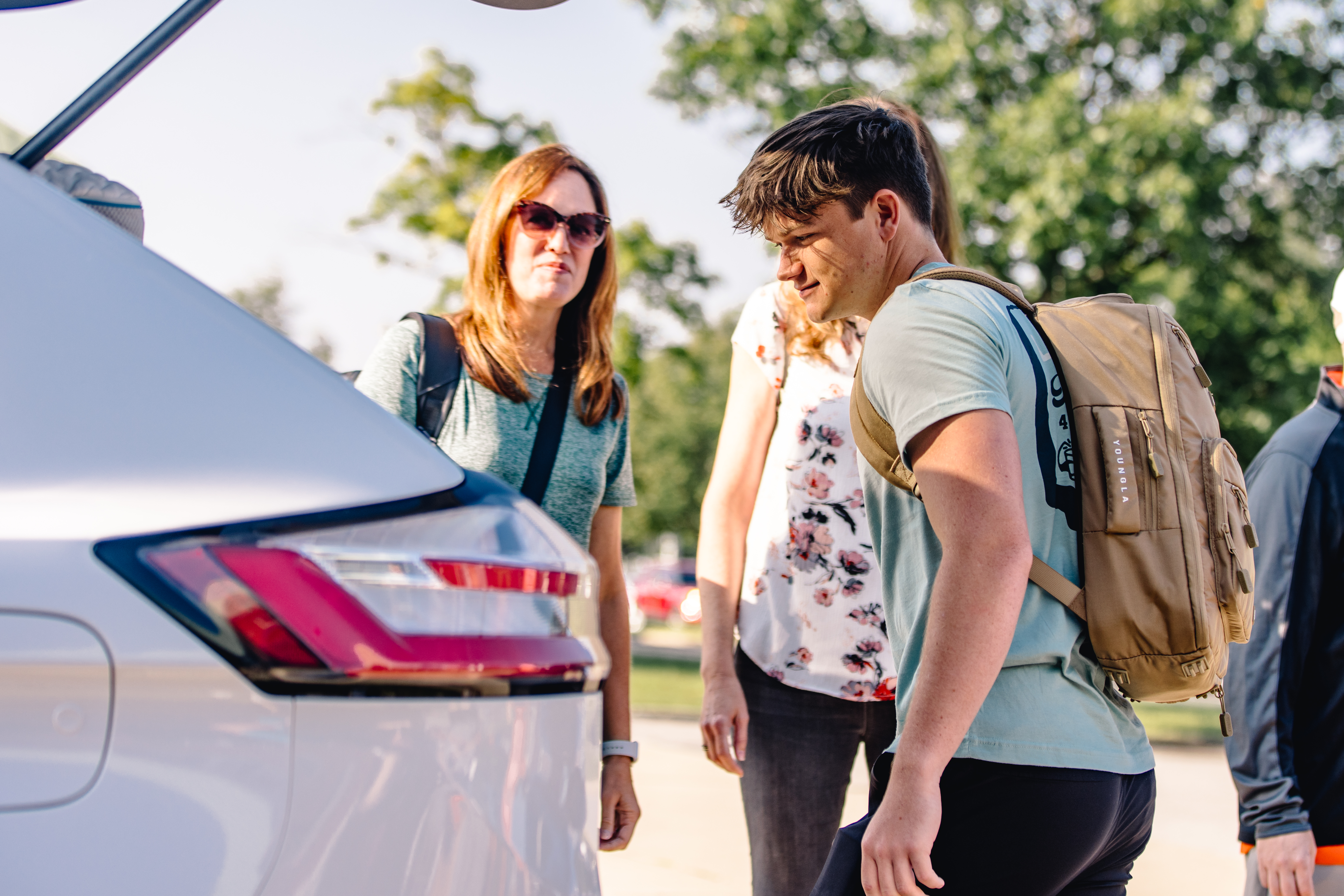 Photo of family loading up the car